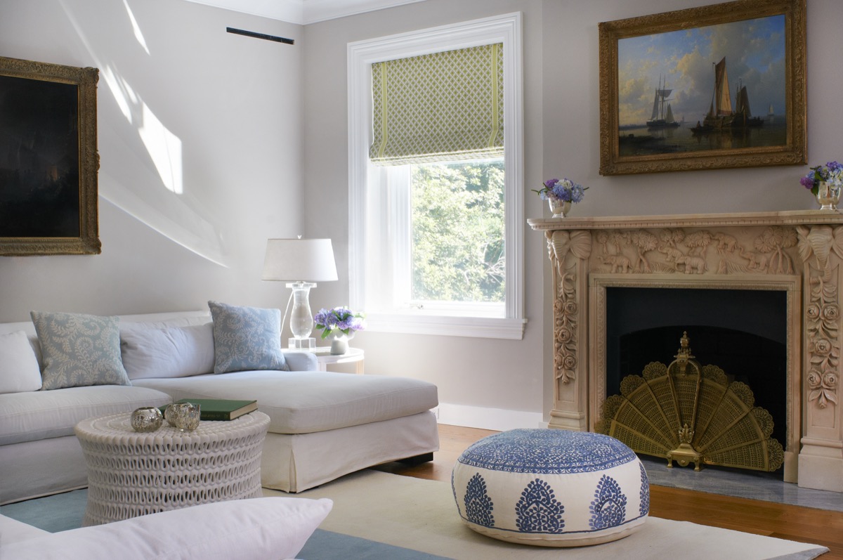 Family room with a carved stone mantel and soft neutrals, Princeton NJ
